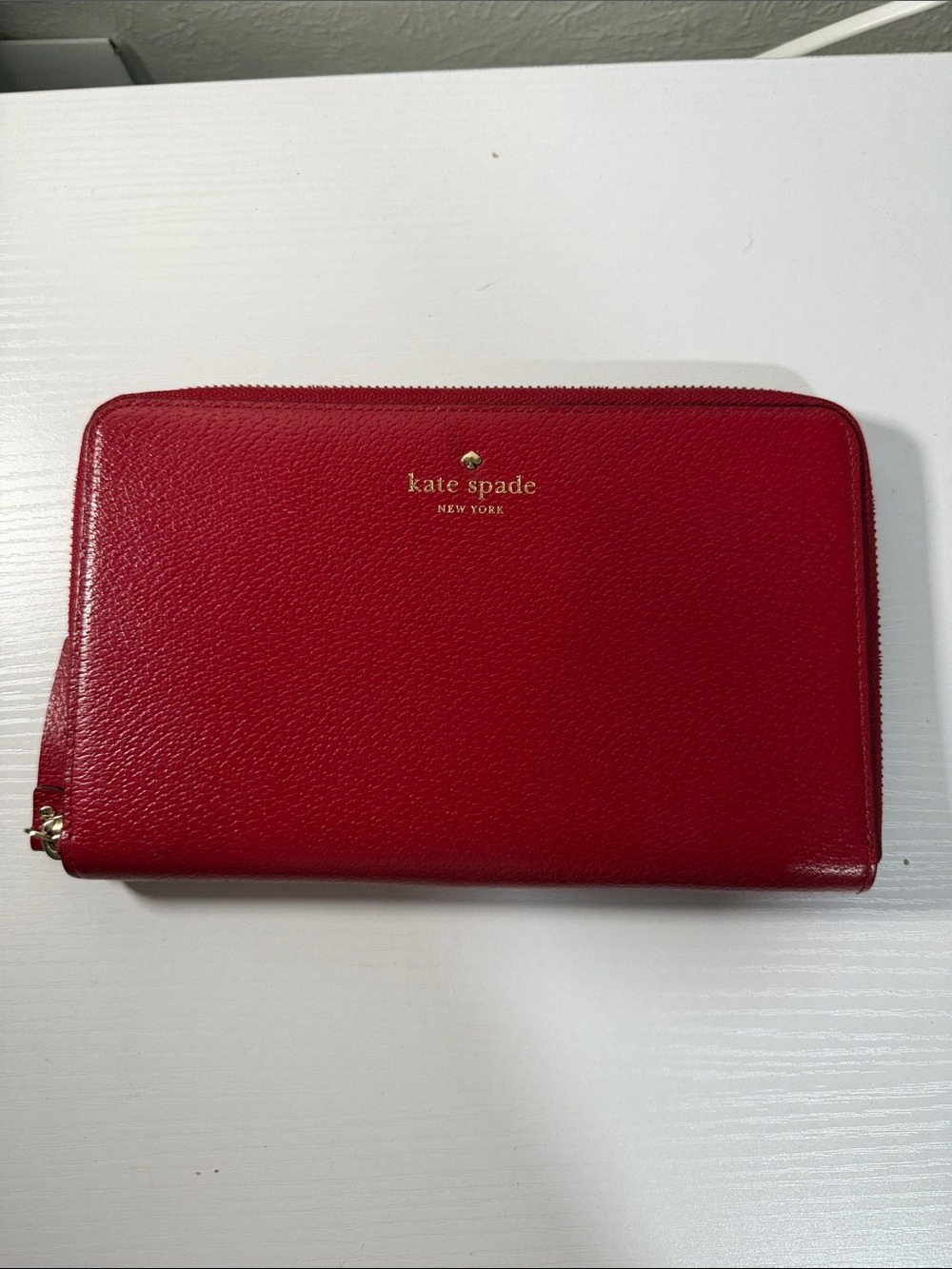kate spade red zip-around continental wallet